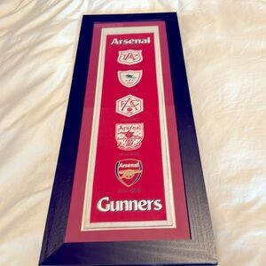 Framed Arsenal badges